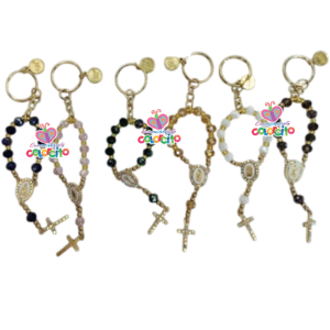 Misa de honras - Llaveros dorados denarios con dije de santos variados